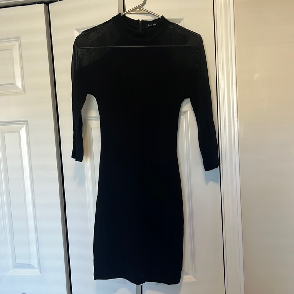 Bebe black cocktail dress with sheer shoulders size xs